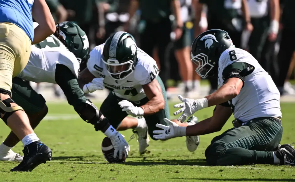 Michigan State recovers a UCLA fumble during the first half...