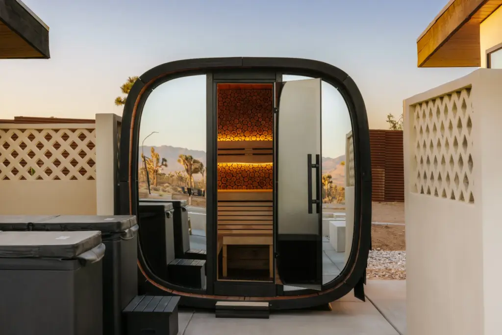 The mirrored-glass Nordic sauna and two Method cold plunges. (Photo...