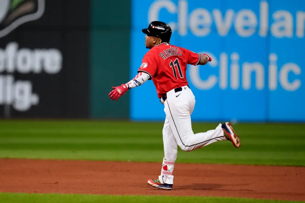 Cleveland Guardians third baseman JosÃ© RamÃ­rez celebrates after hitting a...