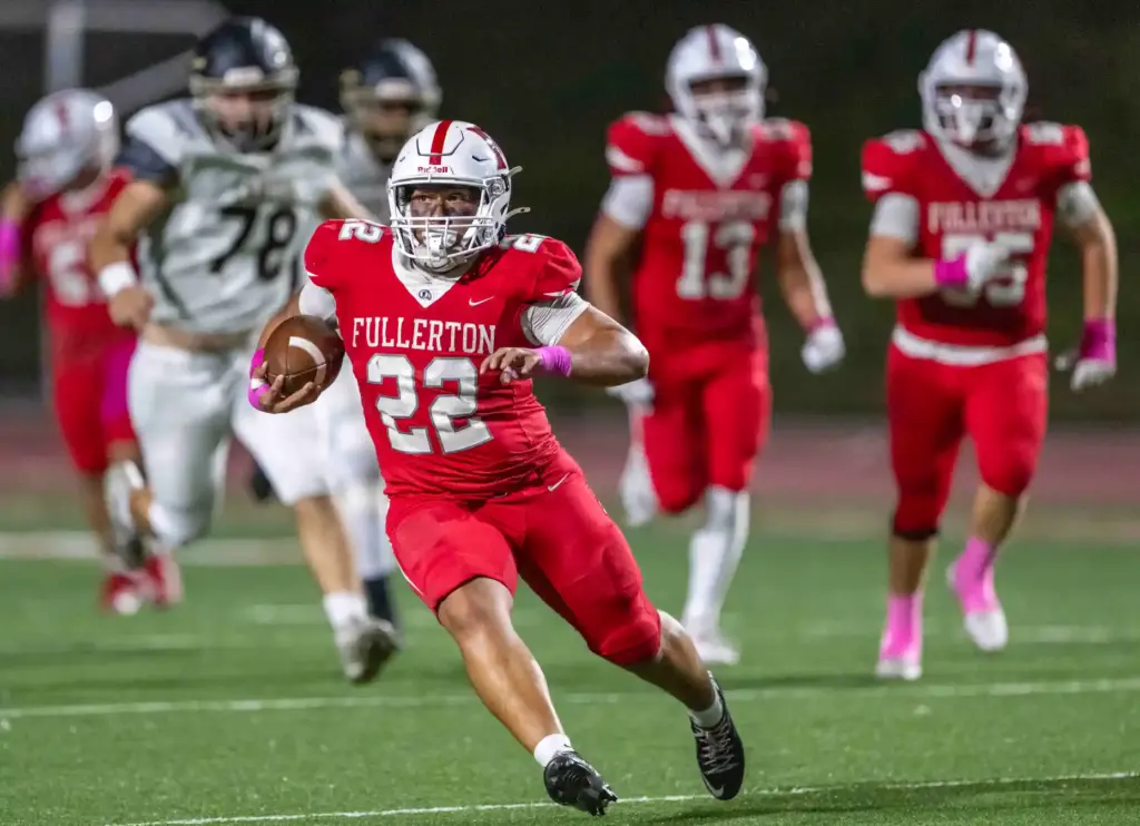 Fullerton running back Evan Tellez-soria (22) carries the ball during...