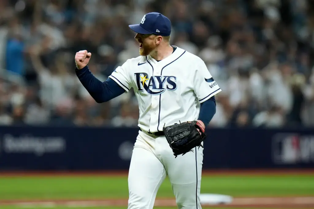 Tampa Bay Rays pitcher Drew Rasmussen celebrates after striking out...