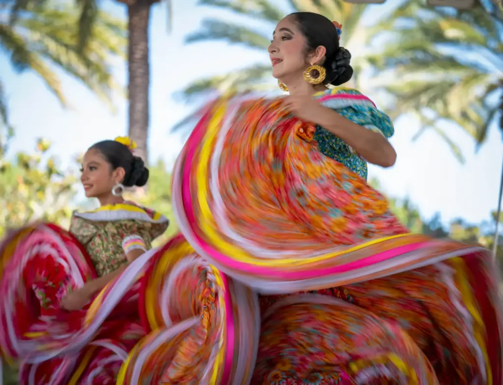 Dancers from the RelÃ¡mpago Del Cielo Mexican folk dance company...