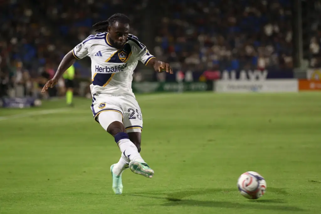 Los Angeles Galaxy forward Joseph Paintsil kicks the ball against...