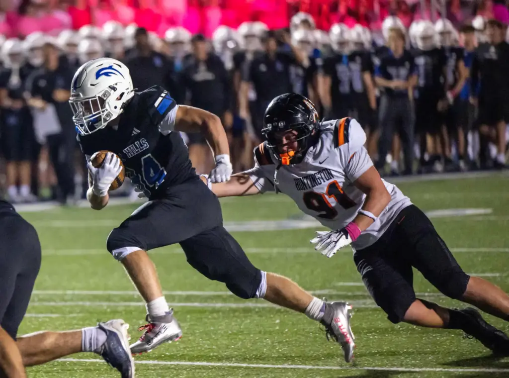 Dana Hills running back Enzo Gallo (84) carries the ball...