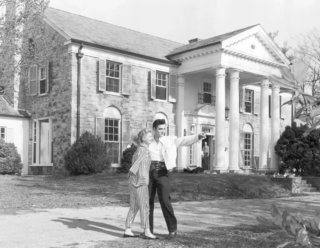 Elvis Presley with his girlfriend, Yvonne Lime, at Graceland in 1957.