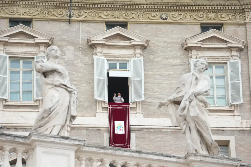 Pope Leo XIV appears at the window of his study...