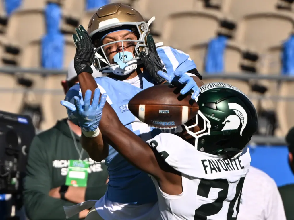 Michigan State cornerback Jeremiah Favorite (24) is called for pass...