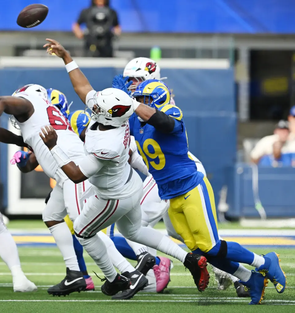 Rams defensive tackle Aaron Donald (99) pressures Arizona Cardinals quarterback...