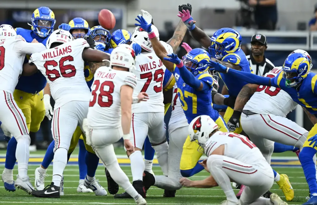 Arizona Cardinals place kicker Chad Ryland (38) kicks a game...
