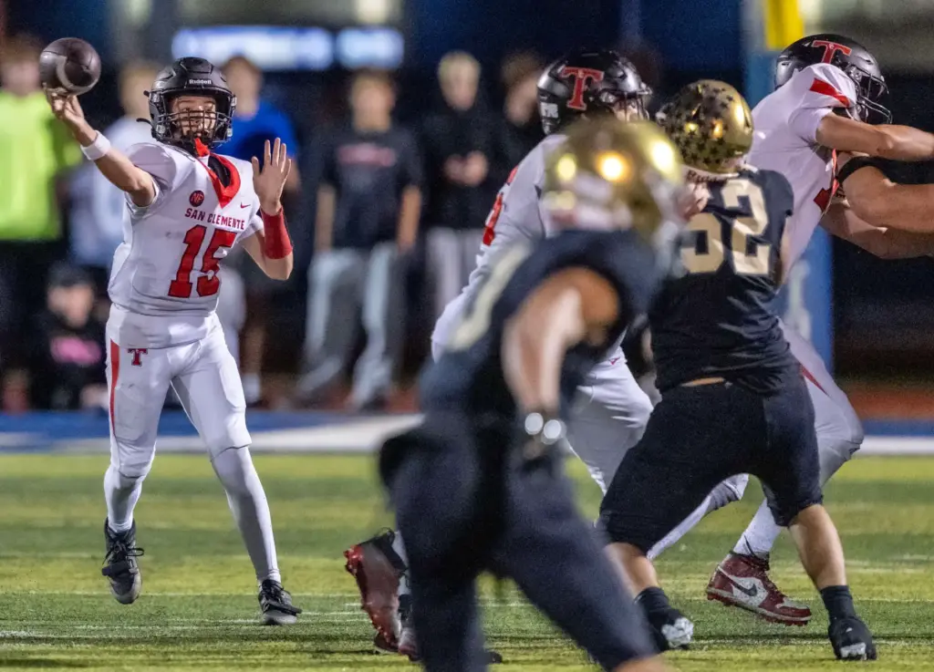 San Clemente quarterback Koston James (15) throws the ball during...