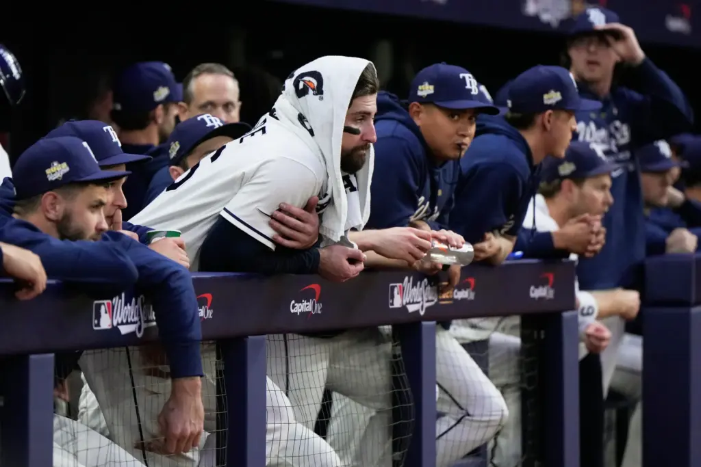 The Tampa Bay Rays watch during the ninth inning of...