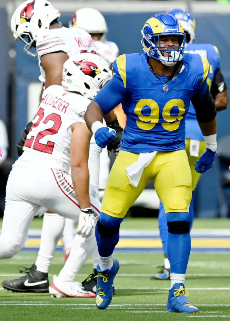 Rams defensive tackle Aaron Donald (99) celebrates after stopping Arizona...