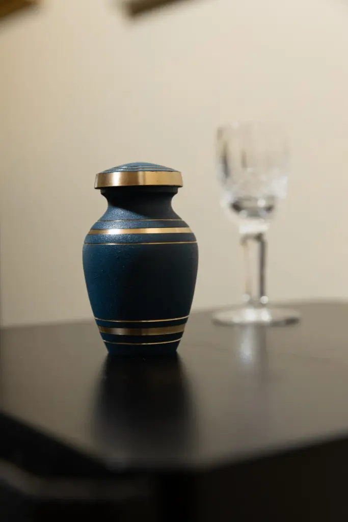 An urn holding the ashes of Kenney Blewett, a Kyle,...