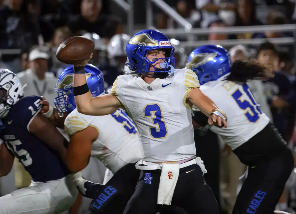 Santa Margarita quarterback Fletch Palmer looks to throw a pass...