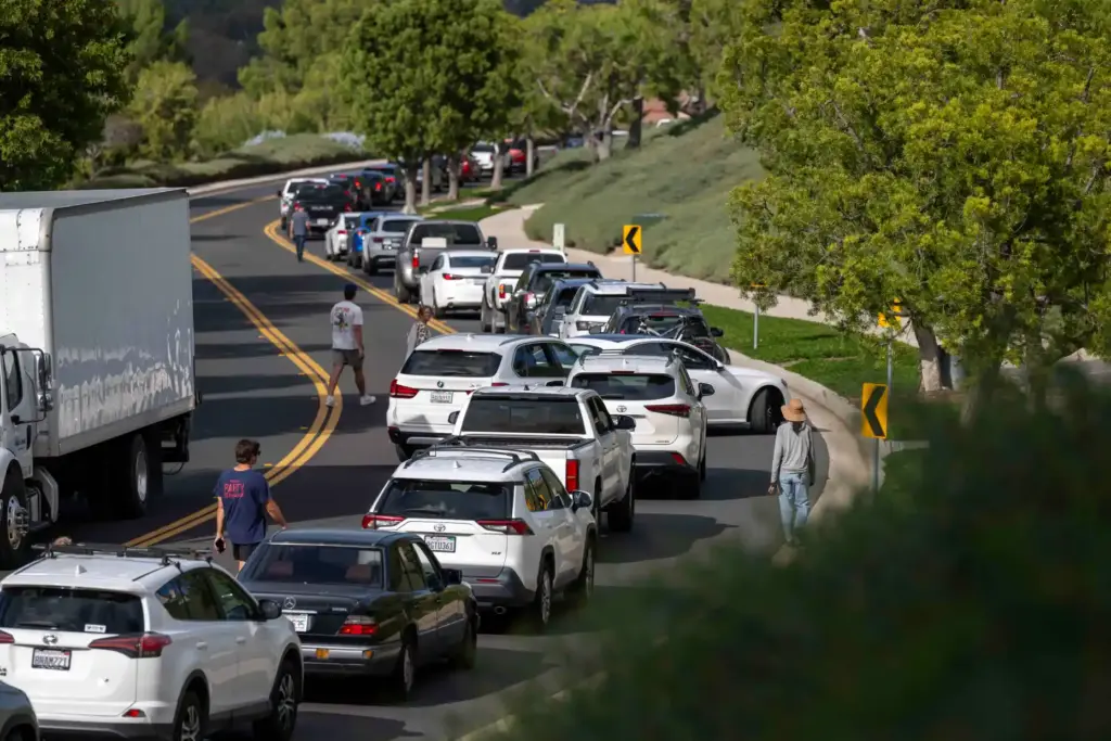 Traffic is at a standstill along La Novia Avenue as...