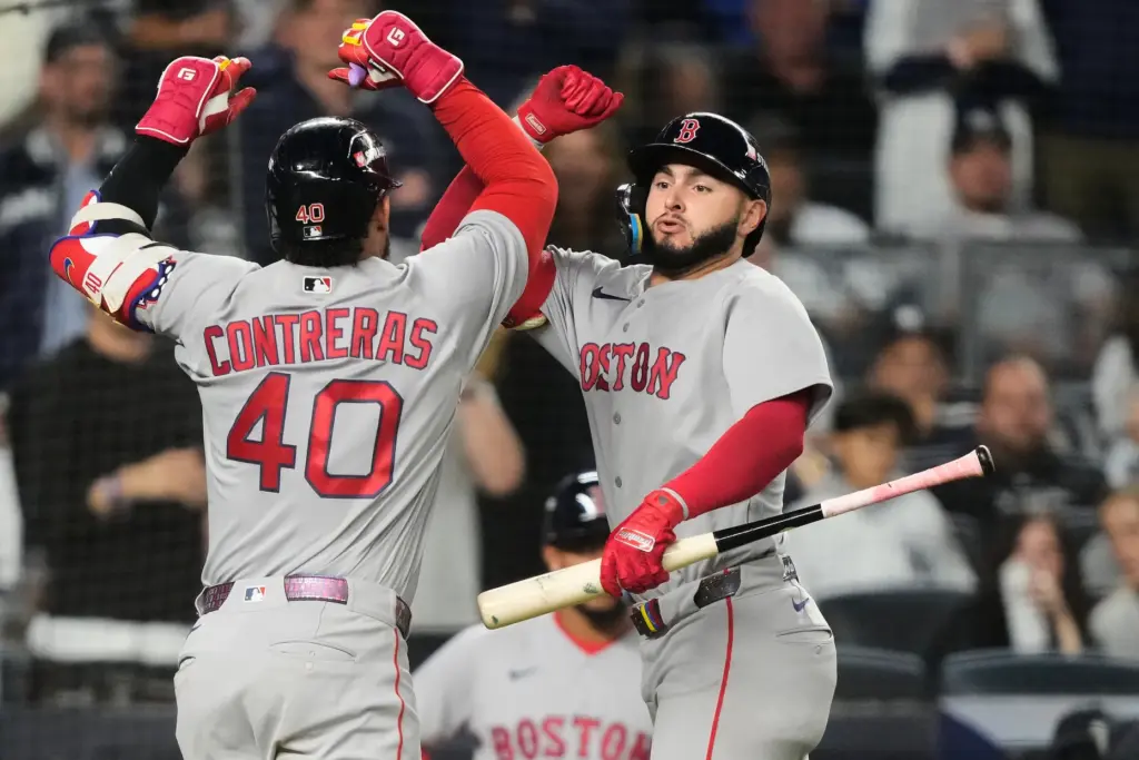 The Boston Red Sox’s Willson Contreras (40) jumps to celebrate...