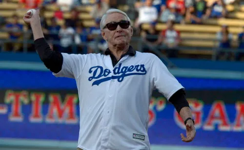 Former Los Angeles Dodgers General Manager Fred Claire throws out...