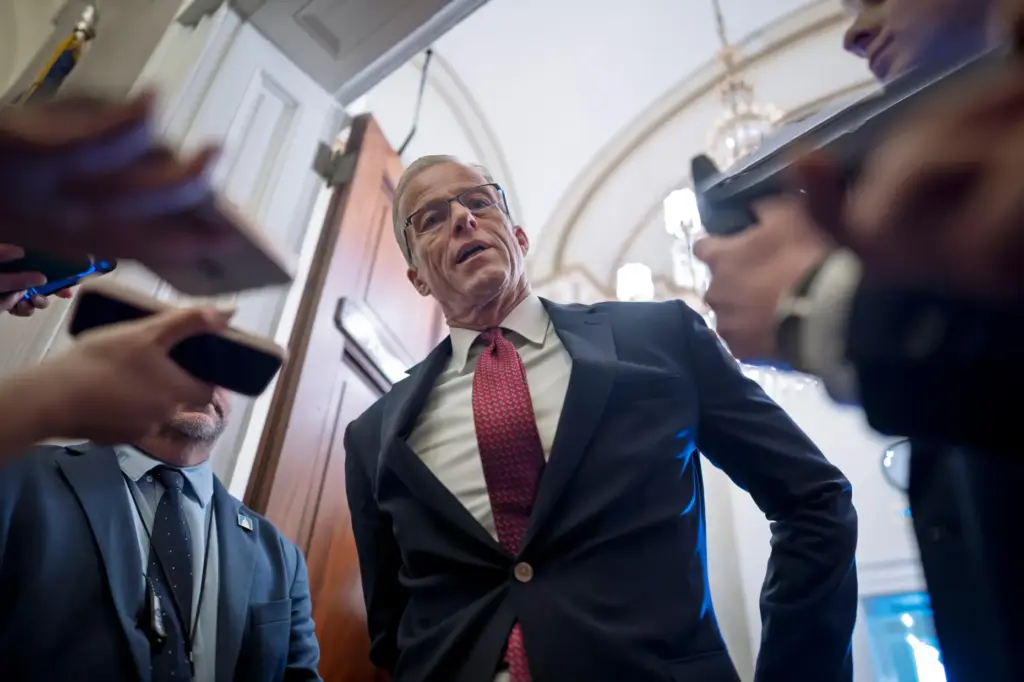 Majority Leader John Thune, R-S.D., responds to reporters asking questions...