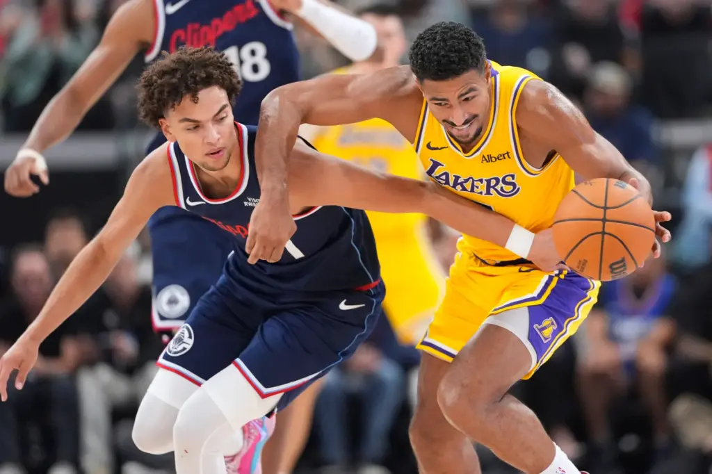 Clippers guard Keaton Wagler, left, and Lakers guard Quentin Grimes...