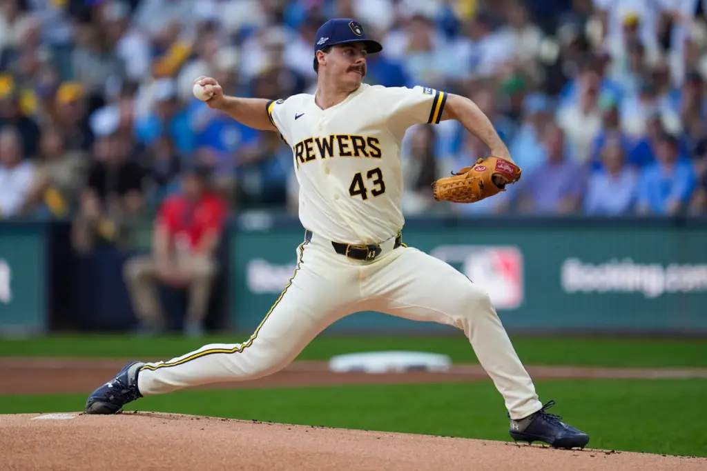 Milwaukee Brewers starting pitcher Logan Henderson throws to the plate...