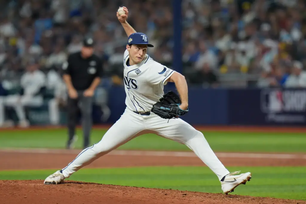 Tampa Bay relief Rays pitcher Kevin Kelly throws to the...
