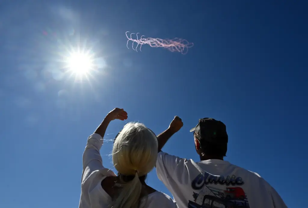 Gary Dinnen, and his wife, Denise Dinnen, of Whittier, watch...