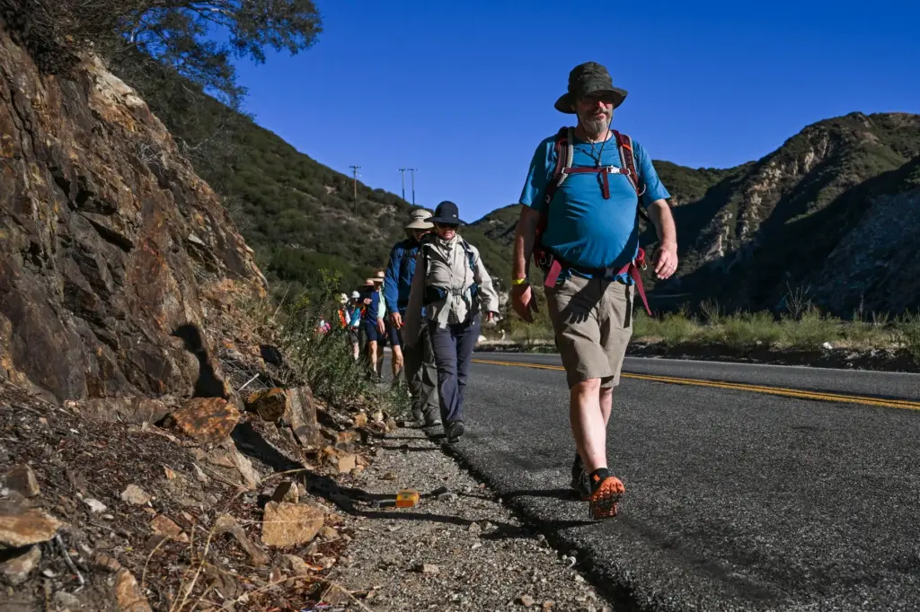 Members of an interfaith group continue a one-week, 96-mile pilgrimage...
