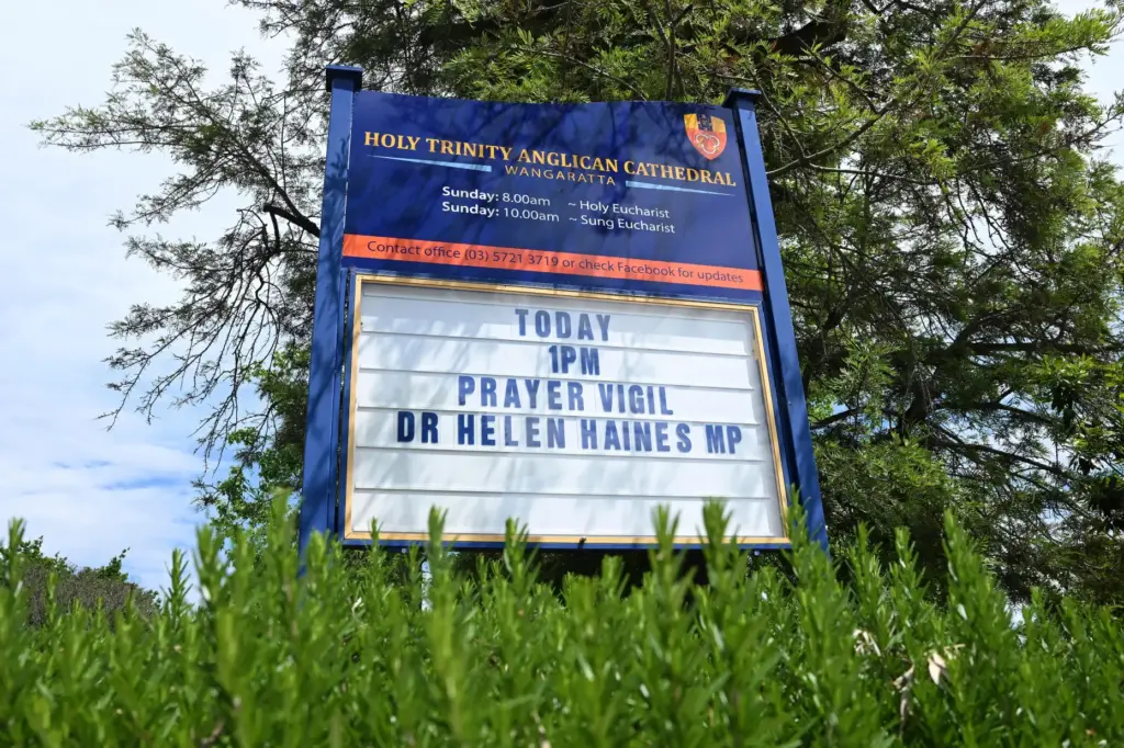 A church sign advertising a vigil for independent member of parliament Helen Haines,