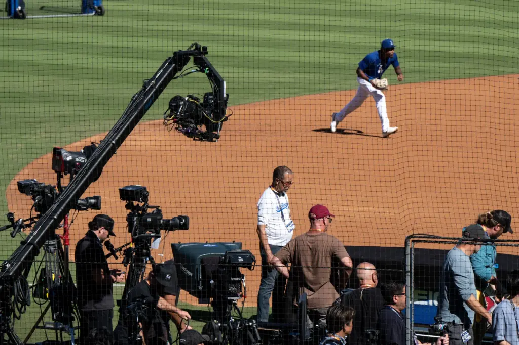 Dodgers players work out in front of the media before...