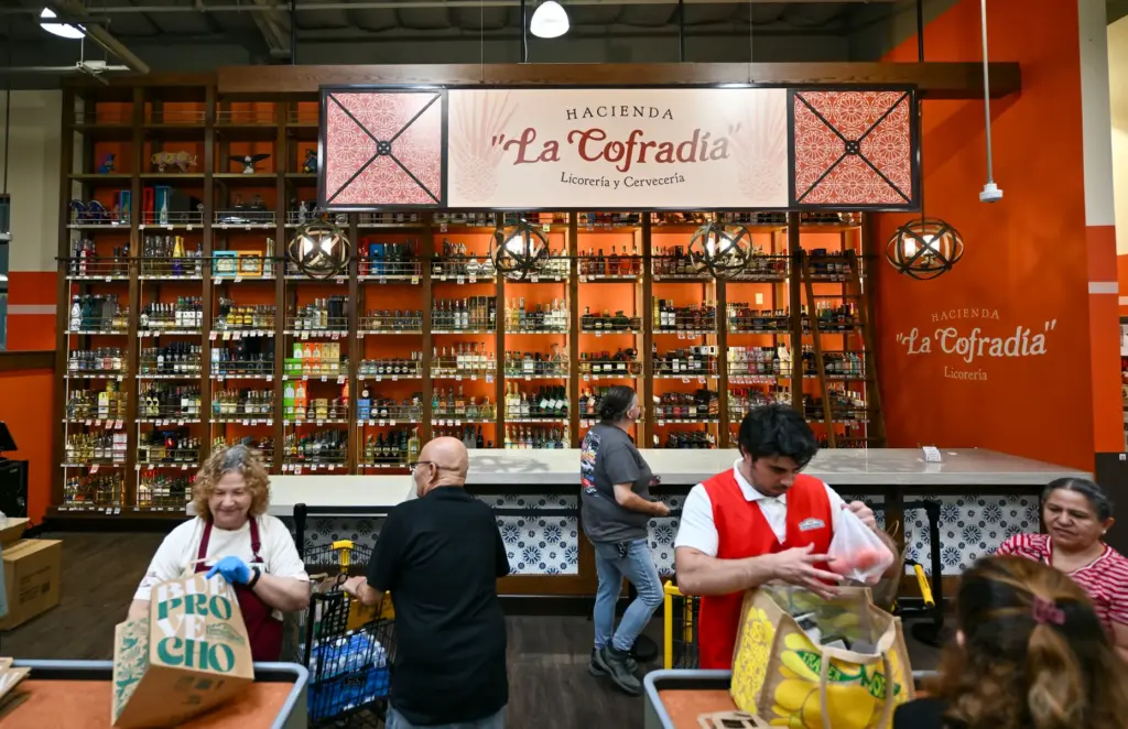 The liquor section during opening day of Mercado GonzÃ¡lez Northgate...