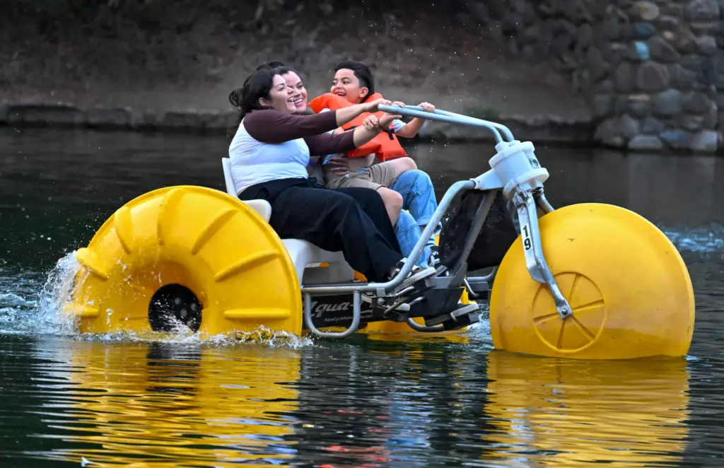 Eileen Gonzalez, left, Sonia Carbajal, and her son, Anthony Carbajal,...