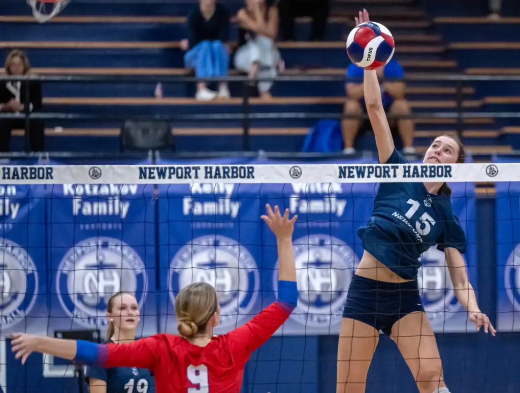 Newport Harbor outside hitter Paulina Zahn (15) finds herself alone...