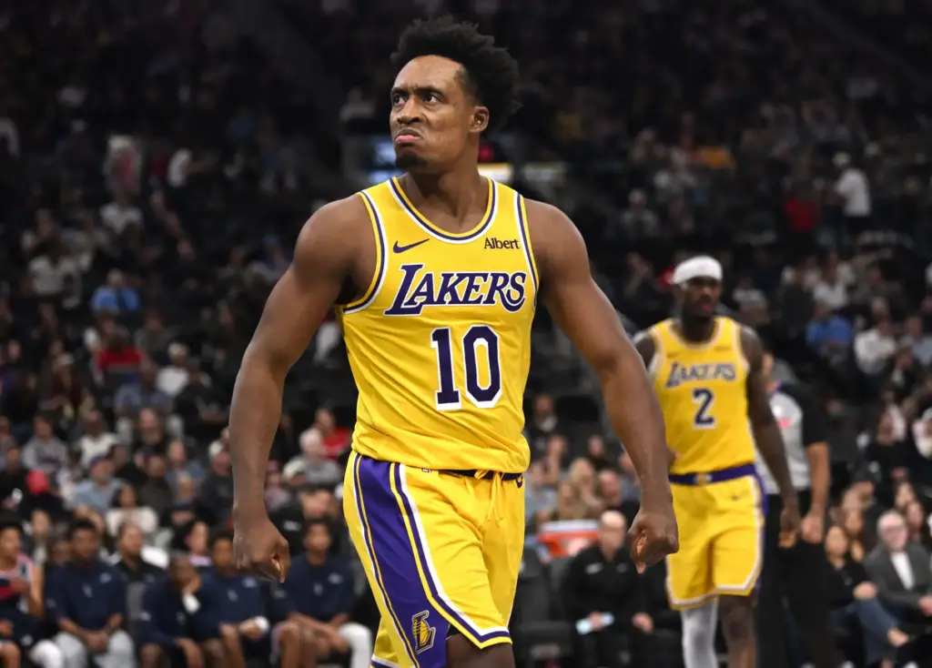 Lakers guard Collin Sexton celebrates after a basket during the...