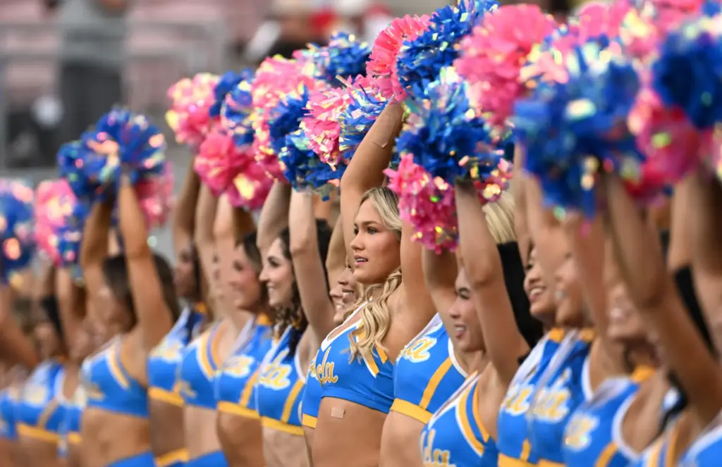 UCLA Bruins cheerleaders perfomr prior to an NCAA football game...