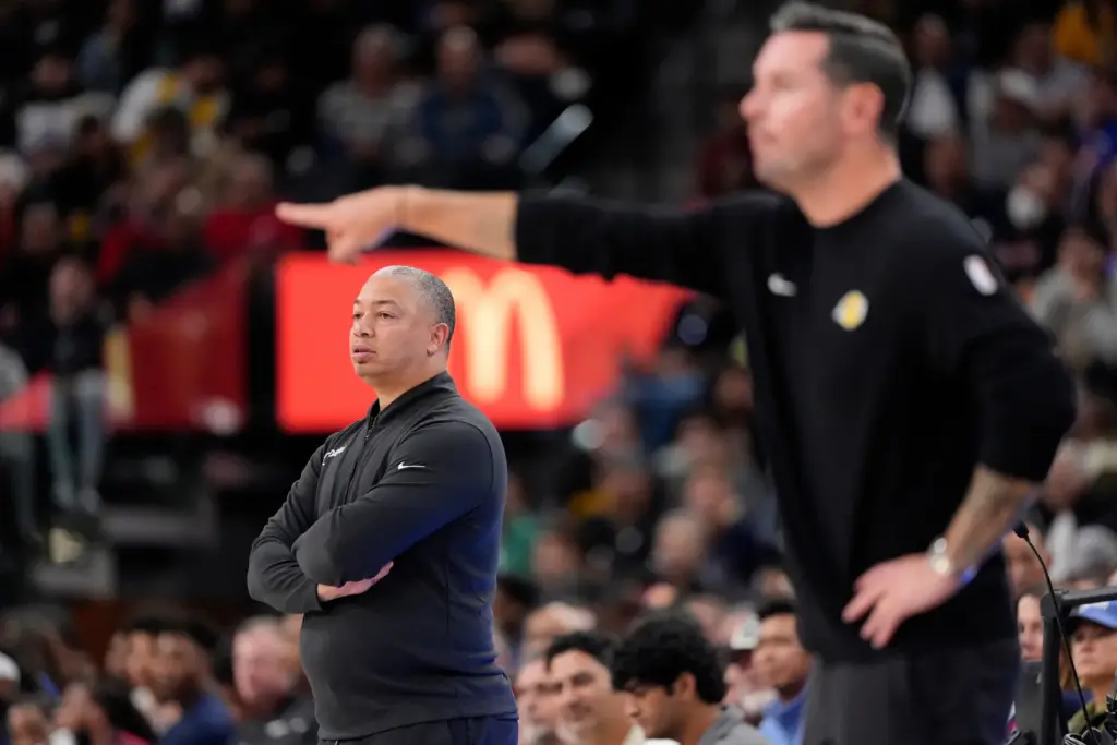 Lakers head coach JJ Redick, right, gestures as Clippers head...