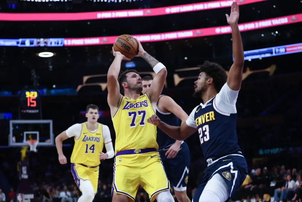 Lakers guard Luka Doncic takes a shot during the first...