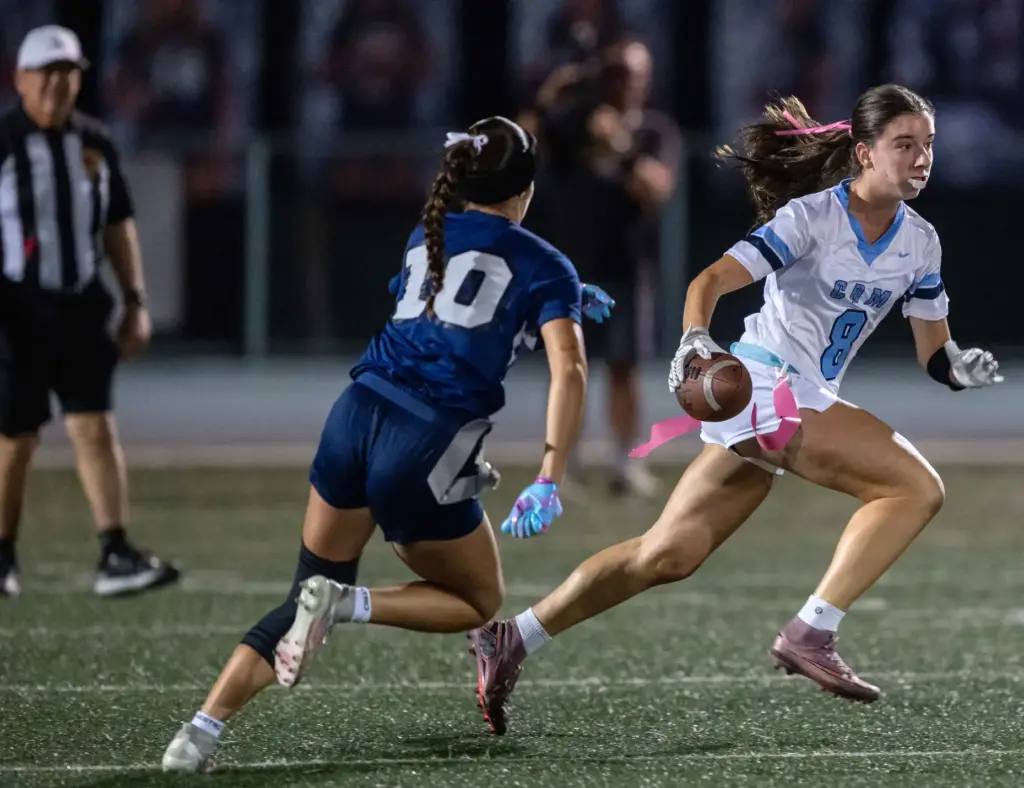 Corona del Mar wide receiver Addison Stern (8) carries the...