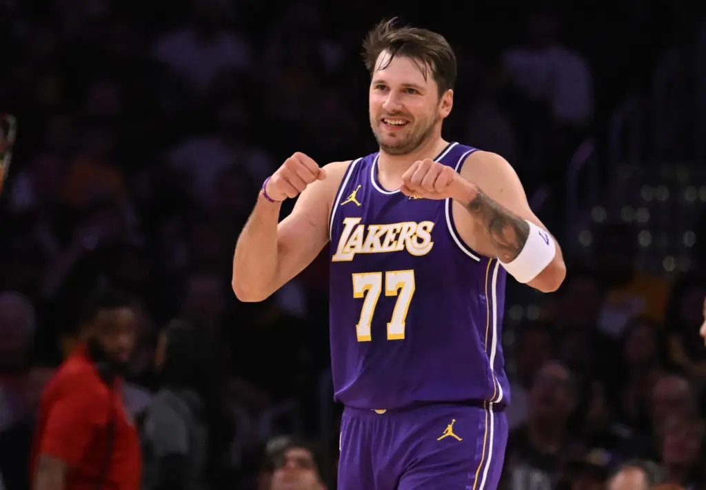 Lakers star Luka Doncic gestures after scoring during the first...