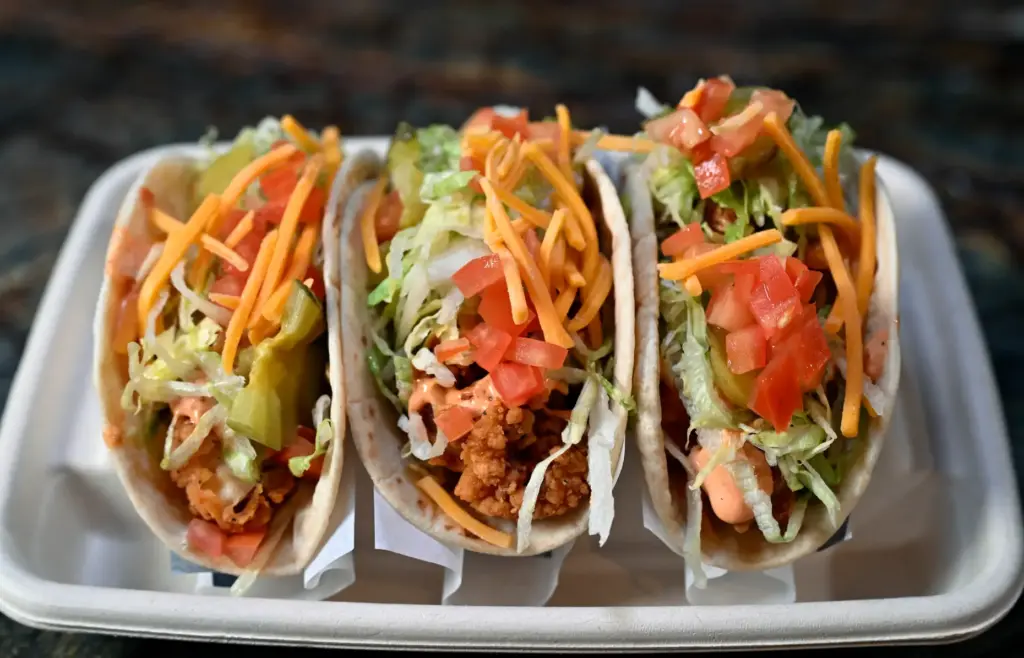 Chicken Tender Tacos, made with chicken tenders, a house sauce...