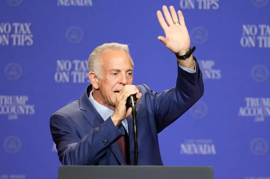 Nevada Gov. Joe Lombardo speaks before President Donald Trump at an event.