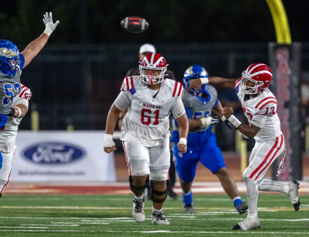 Mater Dei quarterback Paytyn Guess (13) throws the ball during...