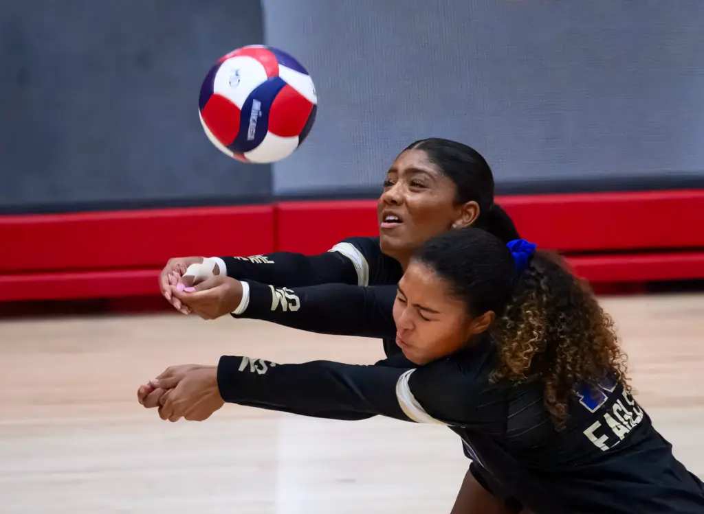Santa Margarita’s Ella Opene, top, and Ari Robinson collide as...