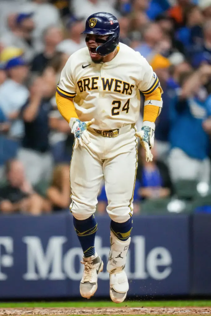 The Milwaukee Brewers’ William Contreras celebrates his RBI single to...