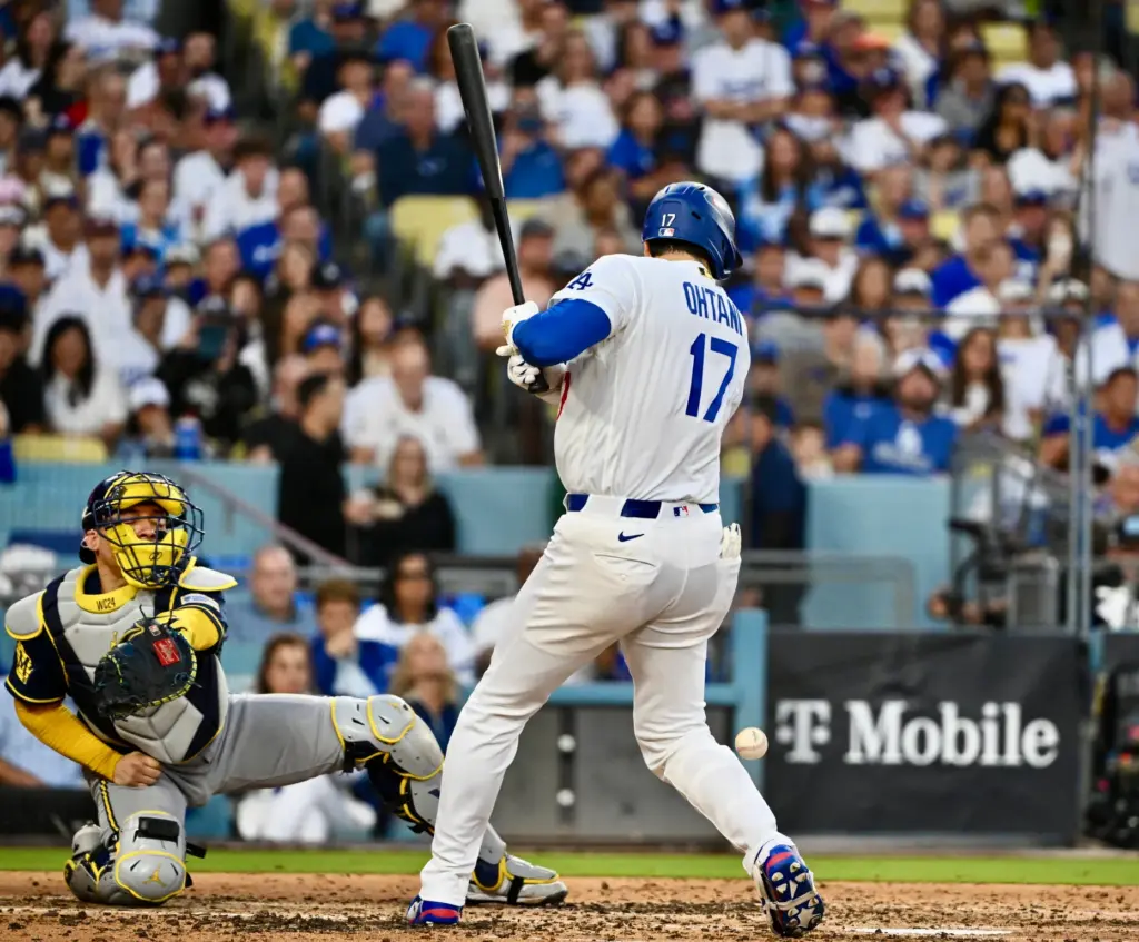 Dodgers star Shohei Ohtani gets hit by a pitch during...