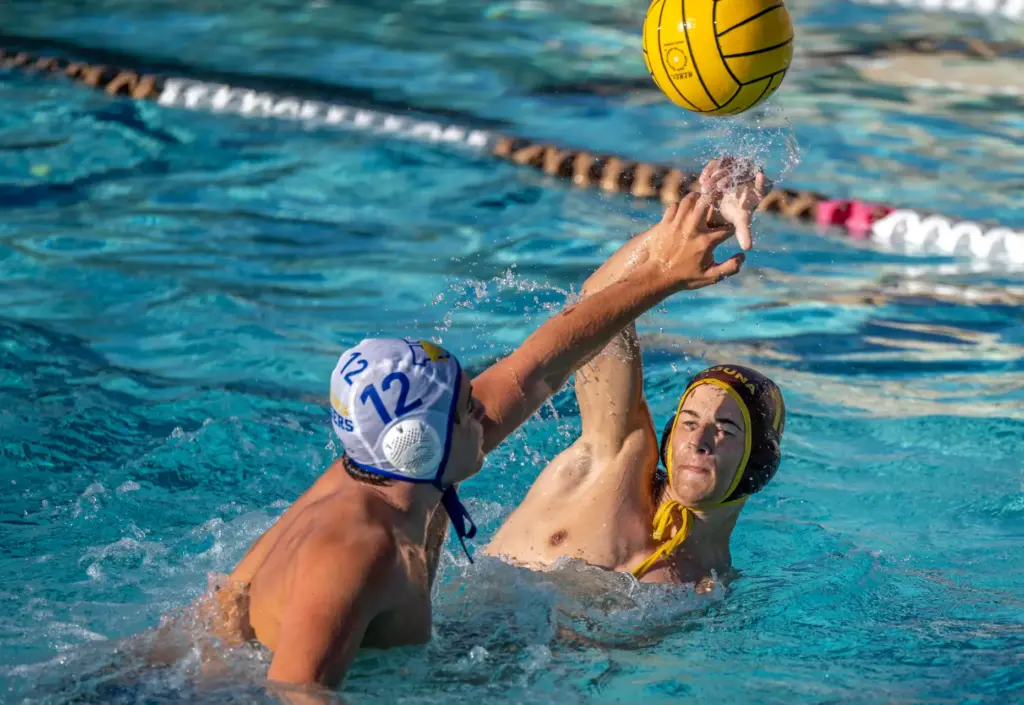Laguna Hillsâ Laird Armstrong shoots a lob shot over Valenciaâs...