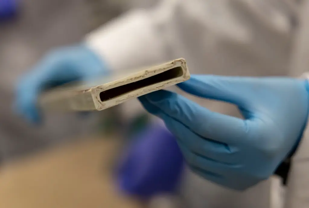 Flax fibers are visible inside an automotive panel developed in...
