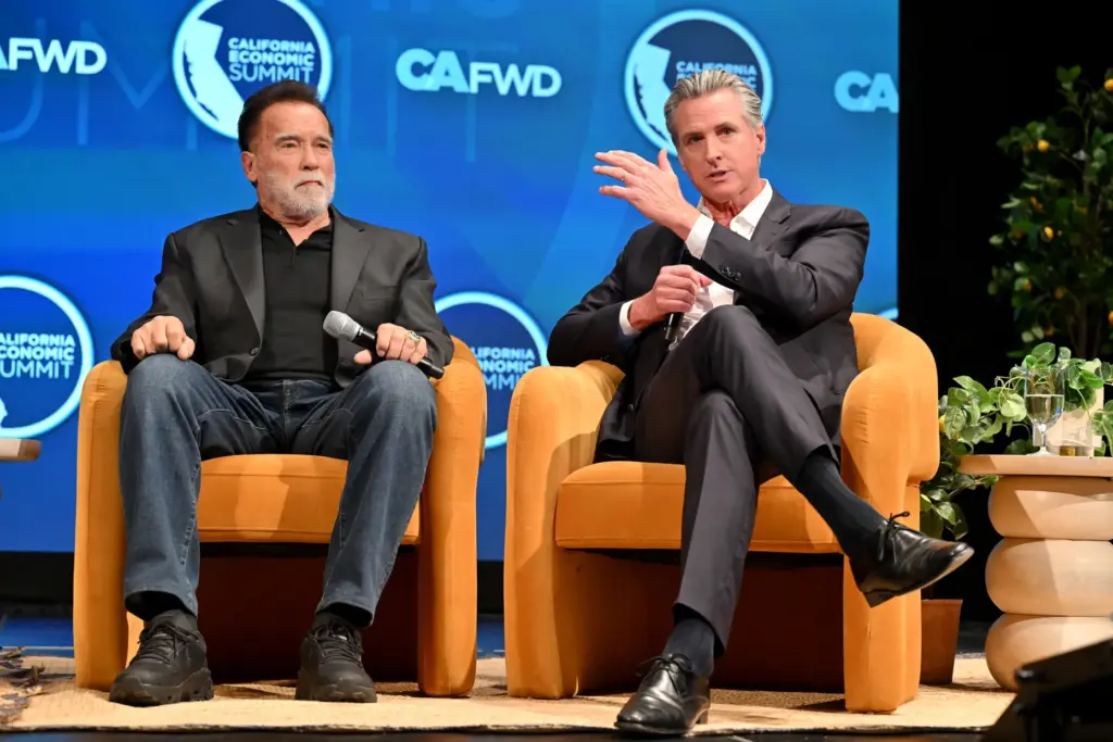 Governor Gavin Newsom participates in a fireside chat with former...
