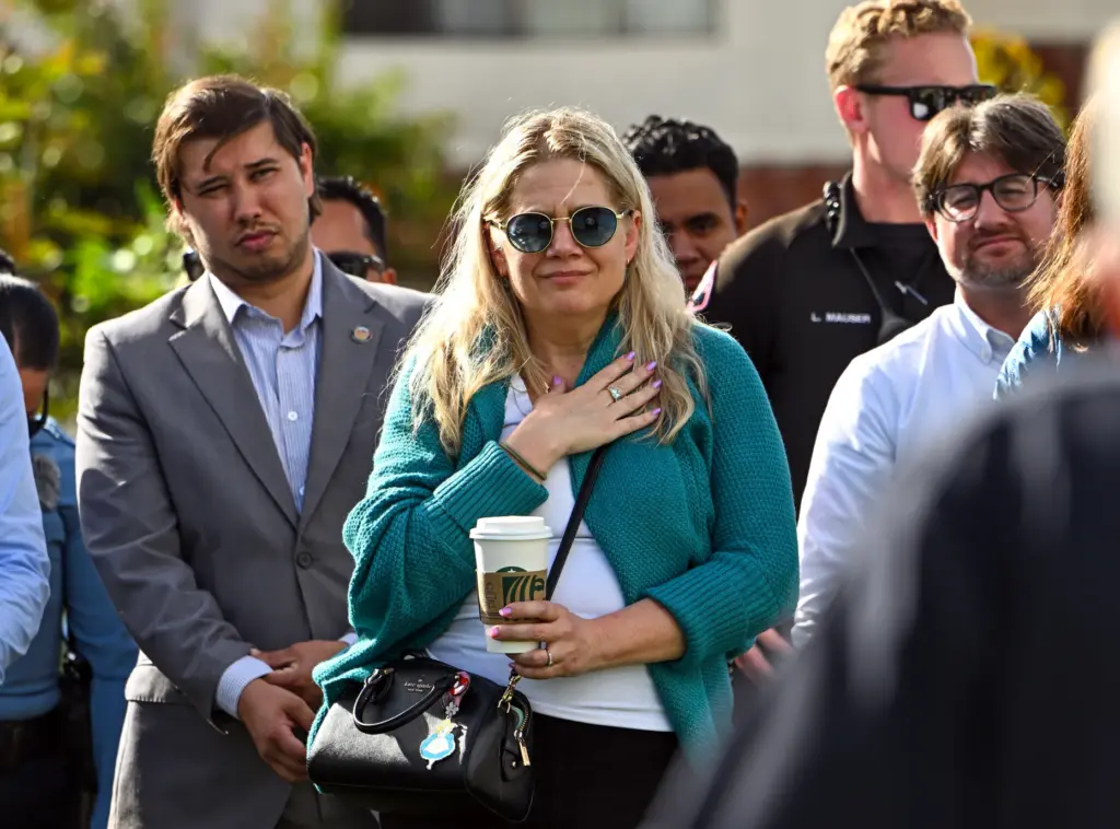 Hilary Ketchum, daughter of James âDaveâ Ketchum, listens as Police...