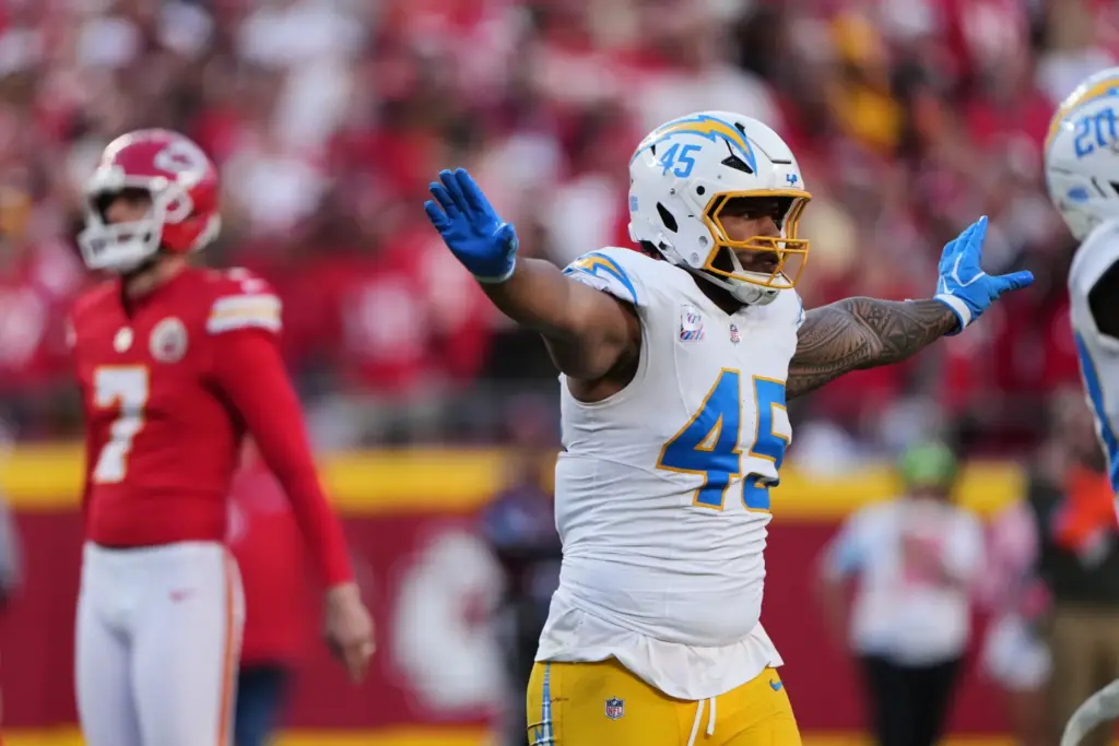 Chargers linebacker Tuli Tuipulotu (45) celebrates a missed field goal...