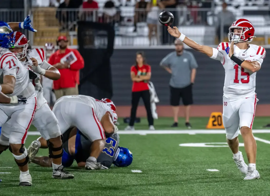 Mater Dei quarterback Cameron Pooley (15) throws the ball during...